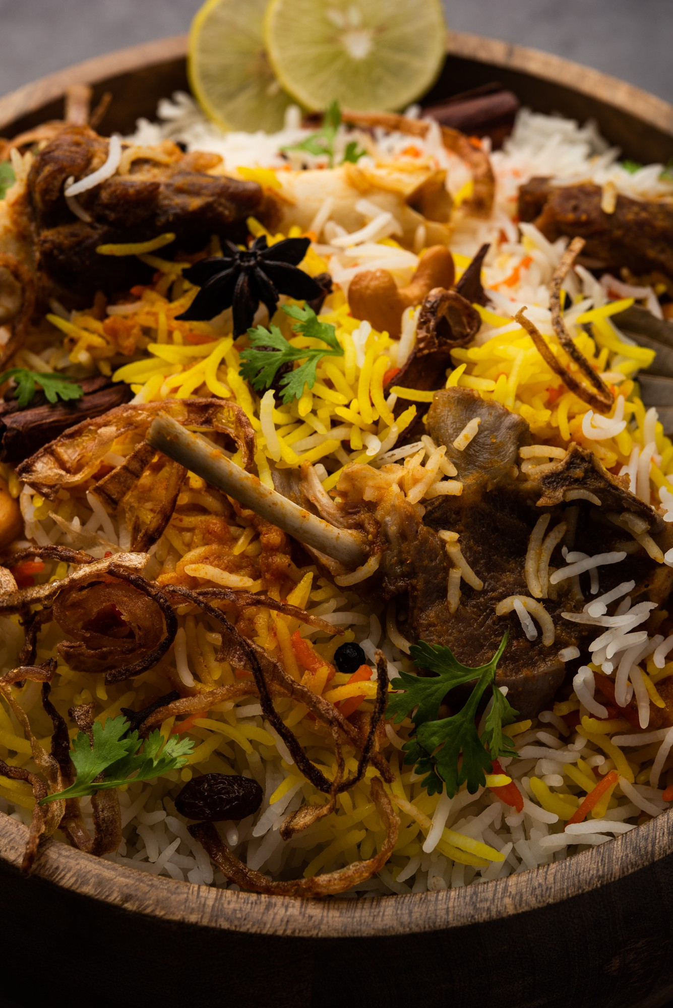 https://www.hyweddingbiryani.sg/media/sampleimageuploader/images/image/m/u/mutton-lamb-biriyani-with-basmati-rice-served-bowl-moody-background.jpg